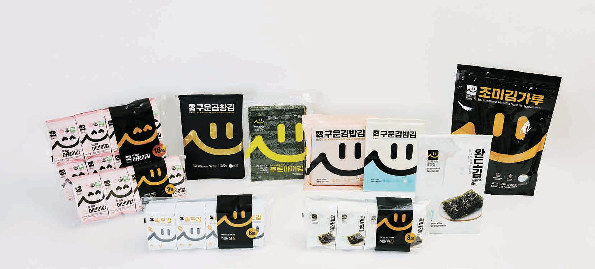The full CHEONG AE JIN SIM product lineup with smile-mark packaging