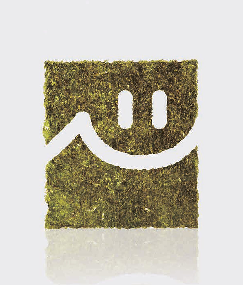 A sheet of roasted Wando gim cut into the CHEONG AE JIN SIM smile mark